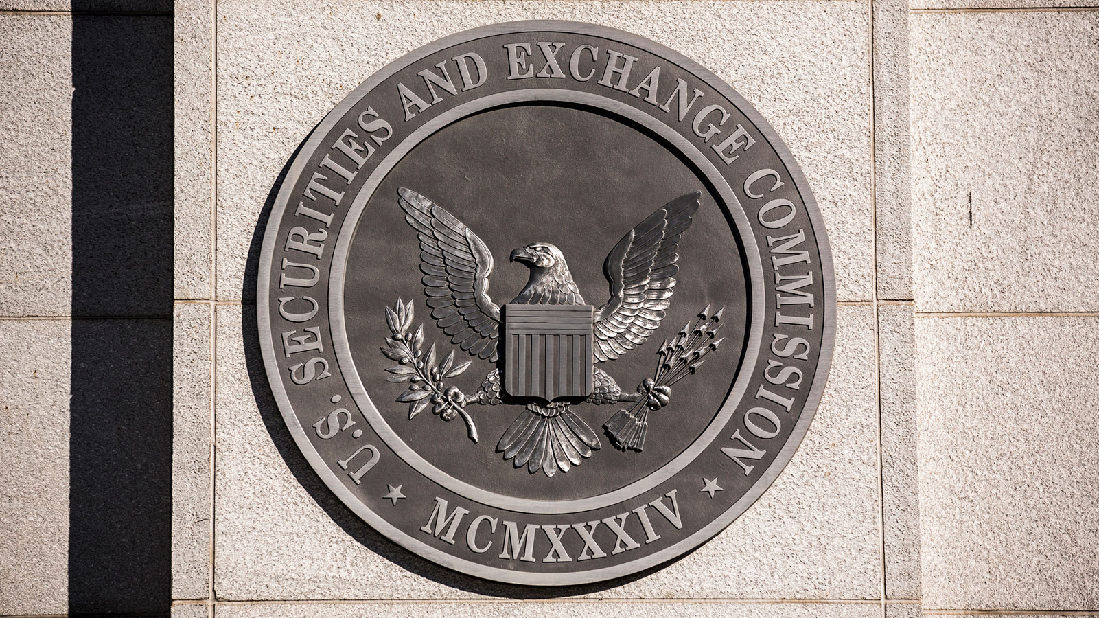 SEC Whistleblower Stops a $100 Million Fraud Scheme - Emblem of SEC Hero